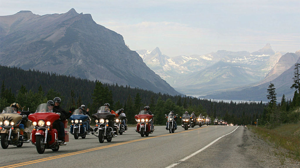 Waving to other motorcycle rider