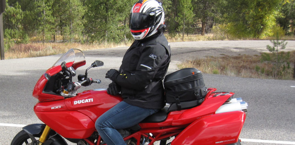 Nelson Rigg CL-1060 Tail Bag attached to the back seat of a ducati multistrada 1100