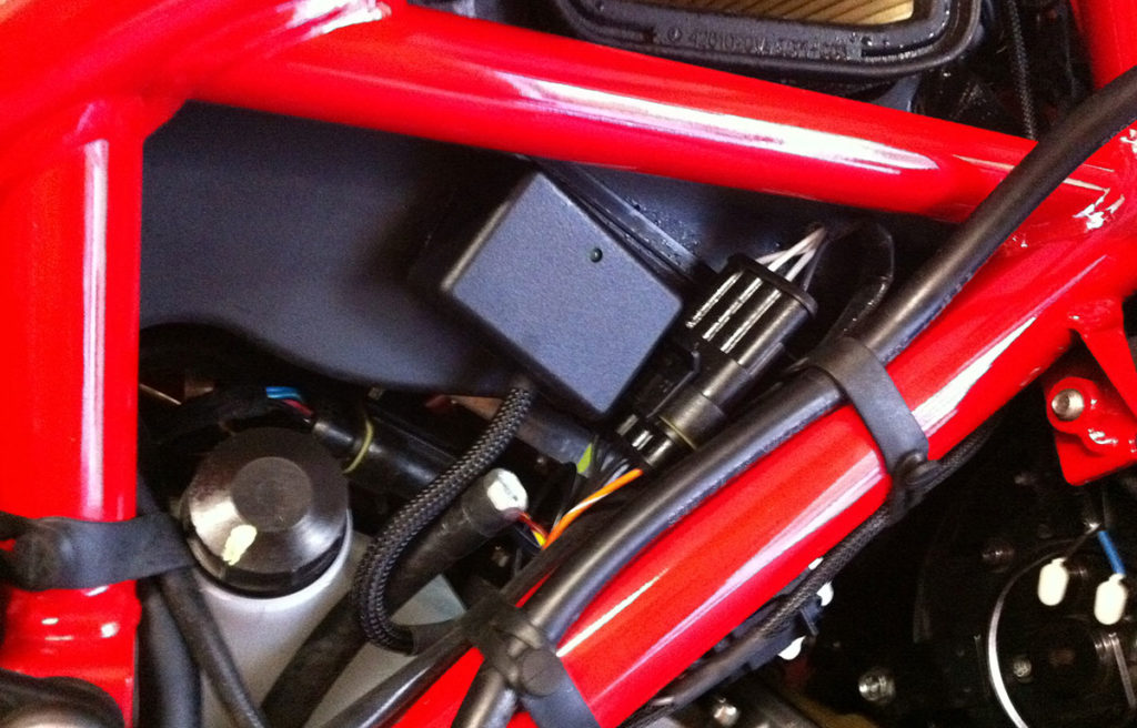 Dynojet Power Commander Optimizer installation location on a Ducati 848 Superbike