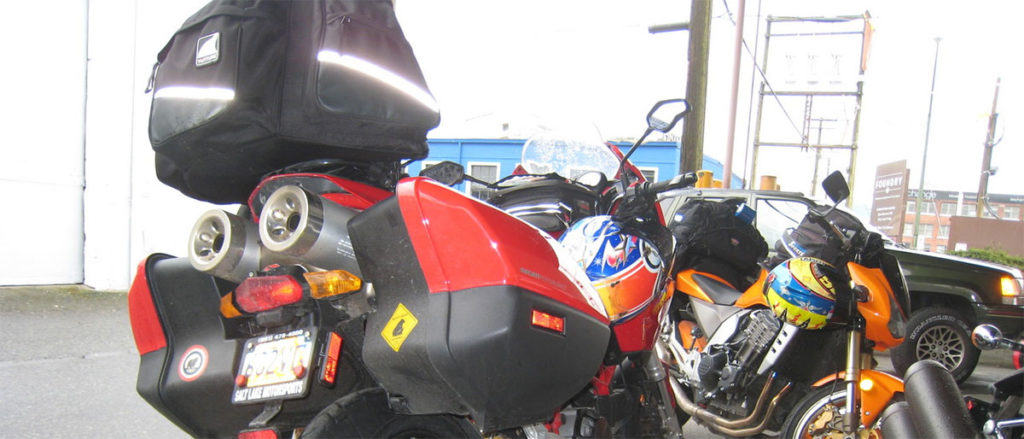 Ventura Motorcycle Luggage Rack system mounted on a Ducati Multistrada with saddlebags